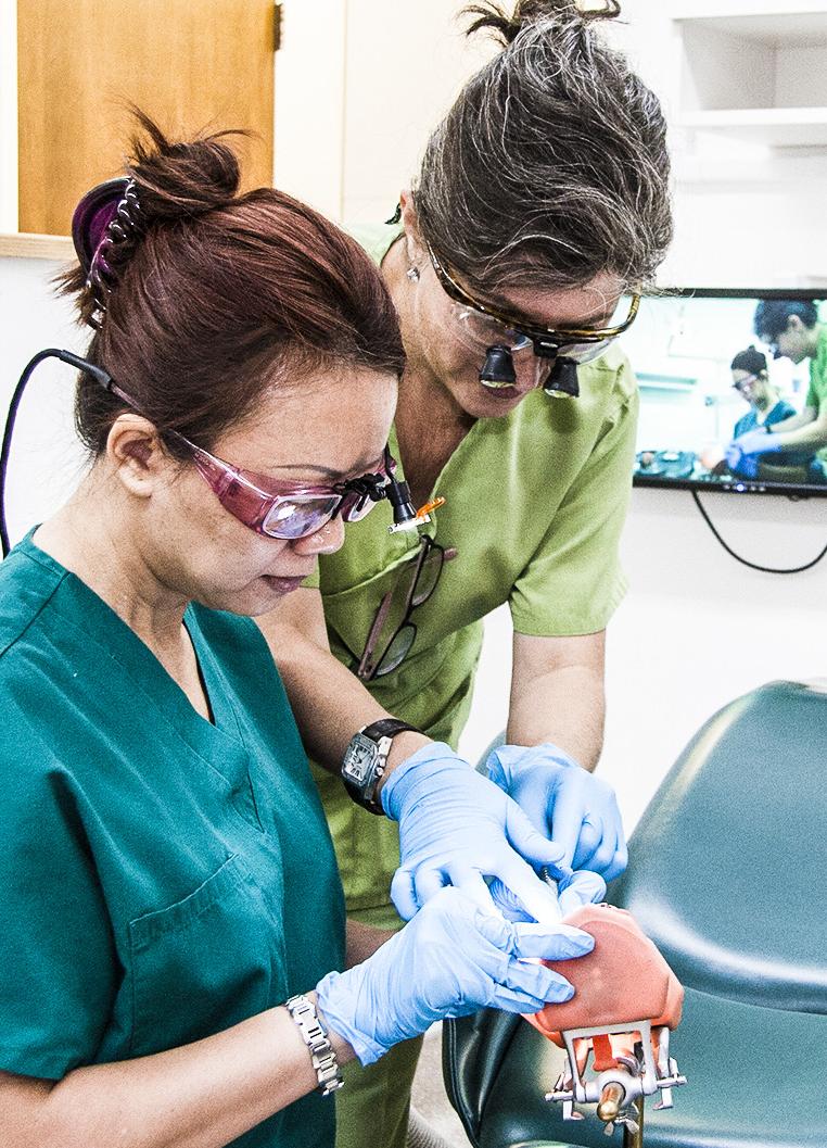 Dental Hygiene student work in class.